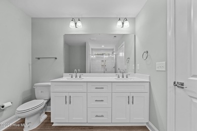 Designed with family living in mind, this home has a thoughtful on Ayden Golf and Country Club in North Carolina - for sale on GolfHomes.com, golf home, golf lot