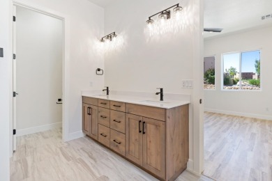 Discover pure comfort in this 4-bed, 4-bath retreat. With 2,554 on Sand Hollow Golf Resort in Utah - for sale on GolfHomes.com, golf home, golf lot