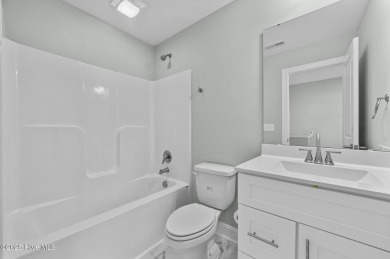 Designed with family living in mind, this home has a thoughtful on Ayden Golf and Country Club in North Carolina - for sale on GolfHomes.com, golf home, golf lot