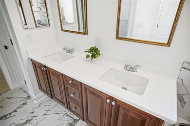 Nestled in Village Oaks of Grand Haven, this Mediterranean style on Grand Haven Golf Club in Florida - for sale on GolfHomes.com, golf home, golf lot