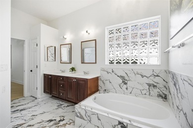 Nestled in Village Oaks of Grand Haven, this Mediterranean style on Grand Haven Golf Club in Florida - for sale on GolfHomes.com, golf home, golf lot