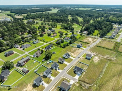 Designed with family living in mind, this home has a thoughtful on Ayden Golf and Country Club in North Carolina - for sale on GolfHomes.com, golf home, golf lot