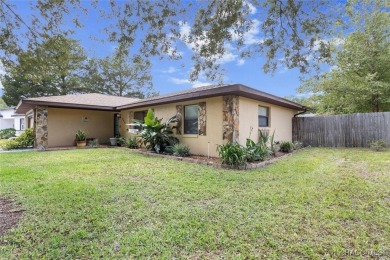 SIMPLY CHARMING! Nestled in Citrus Springs, this well-maintained on Citrus Springs Country Club in Florida - for sale on GolfHomes.com, golf home, golf lot