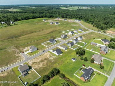 Designed with family living in mind, this home has a thoughtful on Ayden Golf and Country Club in North Carolina - for sale on GolfHomes.com, golf home, golf lot