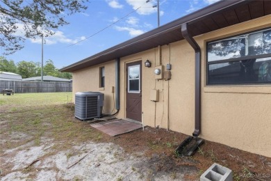 SIMPLY CHARMING! Nestled in Citrus Springs, this well-maintained on Citrus Springs Country Club in Florida - for sale on GolfHomes.com, golf home, golf lot