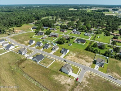 Designed with family living in mind, this home has a thoughtful on Ayden Golf and Country Club in North Carolina - for sale on GolfHomes.com, golf home, golf lot