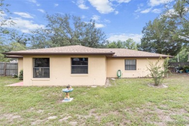 SIMPLY CHARMING! Nestled in Citrus Springs, this well-maintained on Citrus Springs Country Club in Florida - for sale on GolfHomes.com, golf home, golf lot