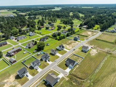 Designed with family living in mind, this home has a thoughtful on Ayden Golf and Country Club in North Carolina - for sale on GolfHomes.com, golf home, golf lot