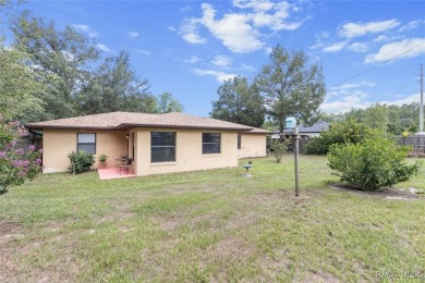 SIMPLY CHARMING! Nestled in Citrus Springs, this well-maintained on Citrus Springs Country Club in Florida - for sale on GolfHomes.com, golf home, golf lot