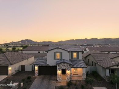 Enjoy panoramic mountain views and Phoenix skyline sunrises from on Verrado Golf Club  in Arizona - for sale on GolfHomes.com, golf home, golf lot