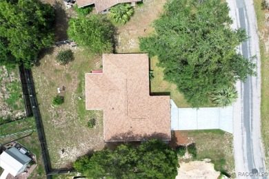 SIMPLY CHARMING! Nestled in Citrus Springs, this well-maintained on Citrus Springs Country Club in Florida - for sale on GolfHomes.com, golf home, golf lot