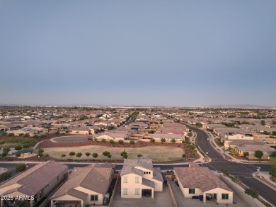 Enjoy panoramic mountain views and Phoenix skyline sunrises from on Verrado Golf Club  in Arizona - for sale on GolfHomes.com, golf home, golf lot