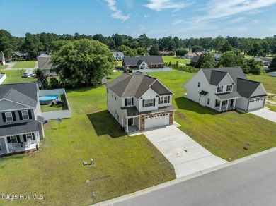 Designed with family living in mind, this home has a thoughtful on Ayden Golf and Country Club in North Carolina - for sale on GolfHomes.com, golf home, golf lot