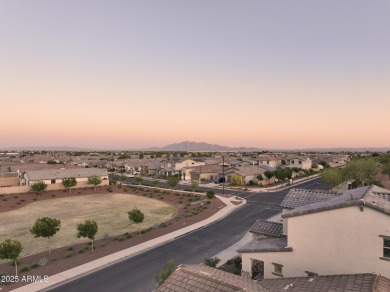 Enjoy panoramic mountain views and Phoenix skyline sunrises from on Verrado Golf Club  in Arizona - for sale on GolfHomes.com, golf home, golf lot