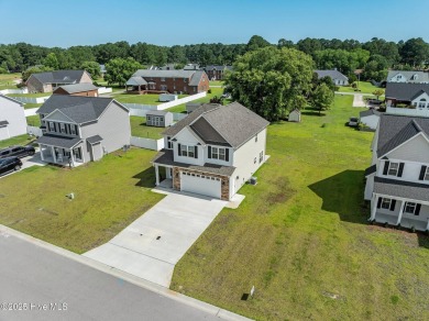 Designed with family living in mind, this home has a thoughtful on Ayden Golf and Country Club in North Carolina - for sale on GolfHomes.com, golf home, golf lot