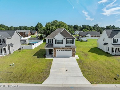 Designed with family living in mind, this home has a thoughtful on Ayden Golf and Country Club in North Carolina - for sale on GolfHomes.com, golf home, golf lot
