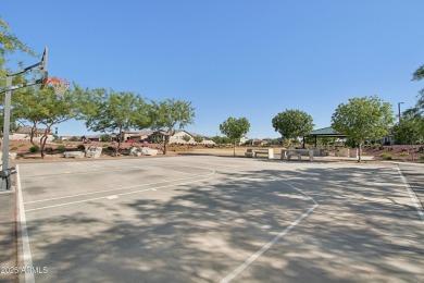 Enjoy panoramic mountain views and Phoenix skyline sunrises from on Verrado Golf Club  in Arizona - for sale on GolfHomes.com, golf home, golf lot