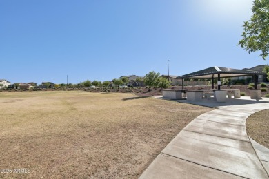 Enjoy panoramic mountain views and Phoenix skyline sunrises from on Verrado Golf Club  in Arizona - for sale on GolfHomes.com, golf home, golf lot