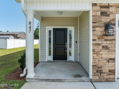 Designed with family living in mind, this home has a thoughtful on Ayden Golf and Country Club in North Carolina - for sale on GolfHomes.com, golf home, golf lot