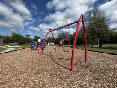 SIMPLY CHARMING! Nestled in Citrus Springs, this well-maintained on Citrus Springs Country Club in Florida - for sale on GolfHomes.com, golf home, golf lot