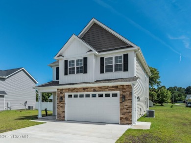 Designed with family living in mind, this home has a thoughtful on Ayden Golf and Country Club in North Carolina - for sale on GolfHomes.com, golf home, golf lot
