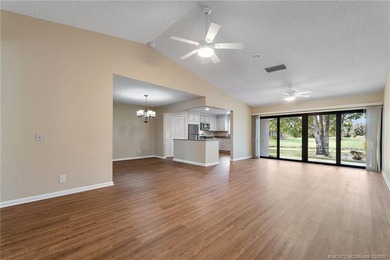 Welcome to this lovely villa set on a peaceful lake in the on Martin Downs Country Club in Florida - for sale on GolfHomes.com, golf home, golf lot