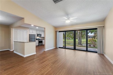 Welcome to this lovely villa set on a peaceful lake in the on Martin Downs Country Club in Florida - for sale on GolfHomes.com, golf home, golf lot