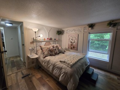 TIRED OF SKY-HIGH RENT? SAY HELLO TO YOUR AFFORDABLE ESCAPE! on Lakes of the North Deer Run Golf Course in Michigan - for sale on GolfHomes.com, golf home, golf lot