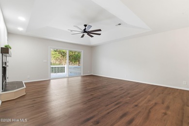 If you love the charm of mature live oaks draped in Spanish moss on Lockwood Folly Country Club in North Carolina - for sale on GolfHomes.com, golf home, golf lot