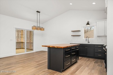 This lovely home is just a short walk to the central, paved on Druid Hills Golf Club in Tennessee - for sale on GolfHomes.com, golf home, golf lot