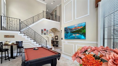 Welcome to an extraordinary Mediterranean-inspired estate on ChampionsGate Golf Resort in Florida - for sale on GolfHomes.com, golf home, golf lot