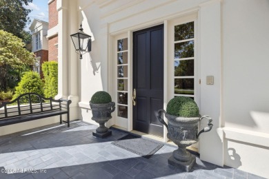 Experience refined living in this stunning Georgian Revival home on Marsh Landing Country Club - Saint Johns County in Florida - for sale on GolfHomes.com, golf home, golf lot