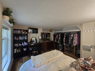 TIRED OF SKY-HIGH RENT? SAY HELLO TO YOUR AFFORDABLE ESCAPE! on Lakes of the North Deer Run Golf Course in Michigan - for sale on GolfHomes.com, golf home, golf lot