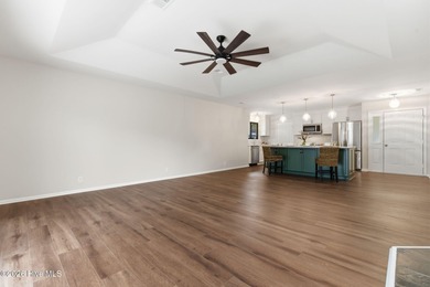 If you love the charm of mature live oaks draped in Spanish moss on Lockwood Folly Country Club in North Carolina - for sale on GolfHomes.com, golf home, golf lot