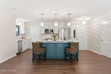 If you love the charm of mature live oaks draped in Spanish moss on Lockwood Folly Country Club in North Carolina - for sale on GolfHomes.com, golf home, golf lot