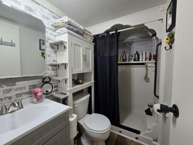 TIRED OF SKY-HIGH RENT? SAY HELLO TO YOUR AFFORDABLE ESCAPE! on Lakes of the North Deer Run Golf Course in Michigan - for sale on GolfHomes.com, golf home, golf lot
