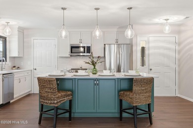 If you love the charm of mature live oaks draped in Spanish moss on Lockwood Folly Country Club in North Carolina - for sale on GolfHomes.com, golf home, golf lot