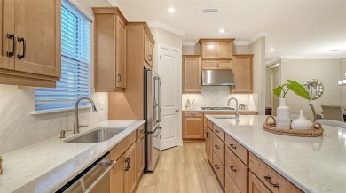 Discover resort-style living at its finest in this fully loaded on Esplanade Golf and Country at Lakewood Ranch in Florida - for sale on GolfHomes.com, golf home, golf lot