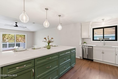 If you love the charm of mature live oaks draped in Spanish moss on Lockwood Folly Country Club in North Carolina - for sale on GolfHomes.com, golf home, golf lot