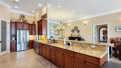 Welcome to an extraordinary Mediterranean-inspired estate on ChampionsGate Golf Resort in Florida - for sale on GolfHomes.com, golf home, golf lot