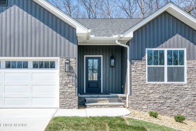 This lovely home is just a short walk to the central, paved on Druid Hills Golf Club in Tennessee - for sale on GolfHomes.com, golf home, golf lot