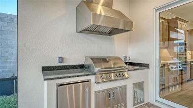 Discover resort-style living at its finest in this fully loaded on Esplanade Golf and Country at Lakewood Ranch in Florida - for sale on GolfHomes.com, golf home, golf lot