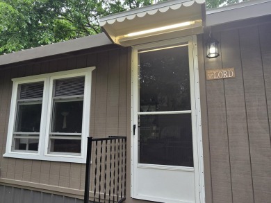 TIRED OF SKY-HIGH RENT? SAY HELLO TO YOUR AFFORDABLE ESCAPE! on Lakes of the North Deer Run Golf Course in Michigan - for sale on GolfHomes.com, golf home, golf lot