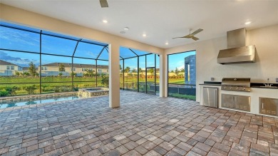 Discover resort-style living at its finest in this fully loaded on Esplanade Golf and Country at Lakewood Ranch in Florida - for sale on GolfHomes.com, golf home, golf lot