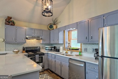 This large 4-bedroom, 3-bedroom home is waiting for new owners on Sky Valley Resort and Country Club in Georgia - for sale on GolfHomes.com, golf home, golf lot