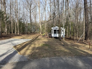 Discover the potential of this unique property located in the on River Golf and Country Club at Lake Royale in North Carolina - for sale on GolfHomes.com, golf home, golf lot