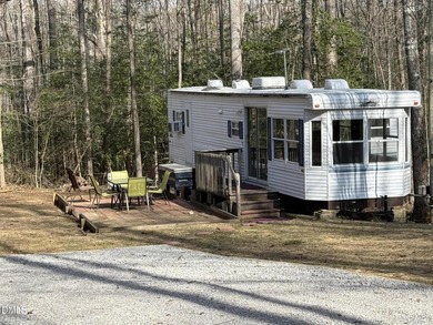 Discover the potential of this unique property located in the on River Golf and Country Club at Lake Royale in North Carolina - for sale on GolfHomes.com, golf home, golf lot
