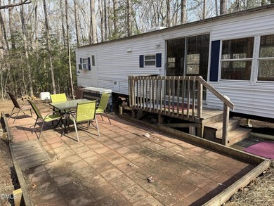 Discover the potential of this unique property located in the on River Golf and Country Club at Lake Royale in North Carolina - for sale on GolfHomes.com, golf home, golf lot