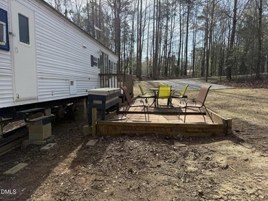 Discover the potential of this unique property located in the on River Golf and Country Club at Lake Royale in North Carolina - for sale on GolfHomes.com, golf home, golf lot