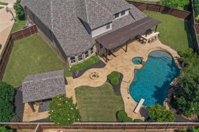 Welcome to this beautifully updated 3,628 sq ft, 4-bedroom home on Trophy Club of Dallas in Texas - for sale on GolfHomes.com, golf home, golf lot